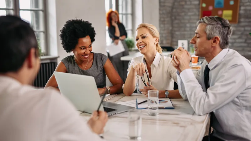 Real estate agency team meeting in a modern office