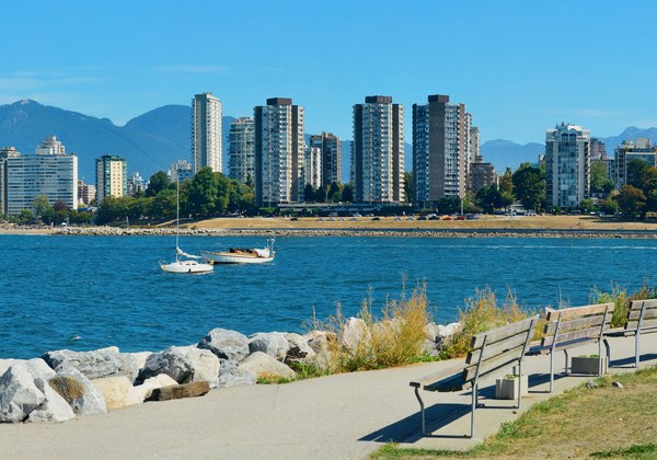 The Vancouver waterfront with apartment towers and mountains